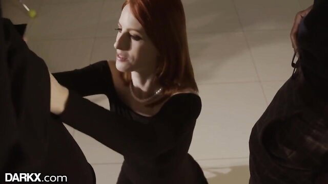 Redhead in black dress kneels for two BBC studs in hot threesome