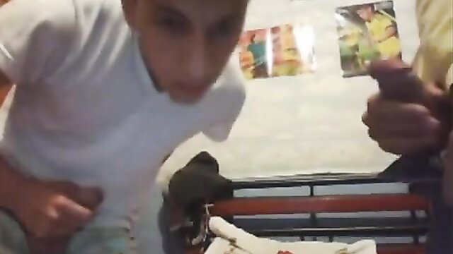 Two young Latinos jerking off outdoors in amateur gay video