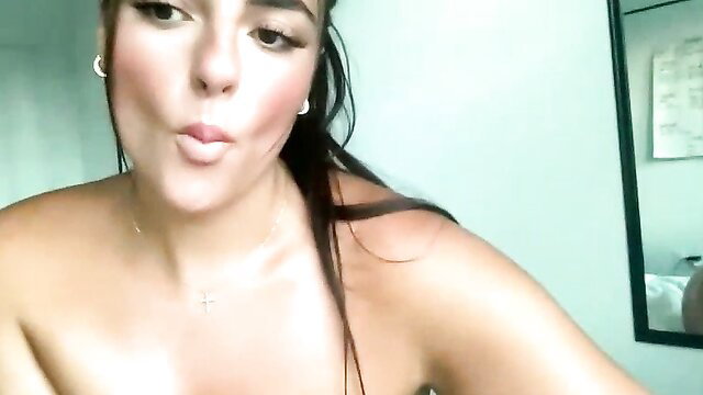 notsosweet21 posing topless in front of the camera