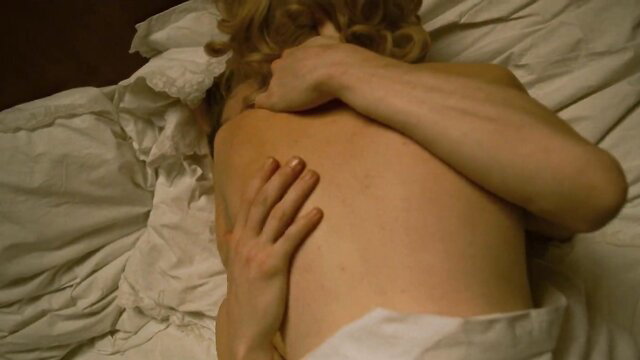 Mia Wasikowska nude back embrace in bed from The Man with the Iron Heart