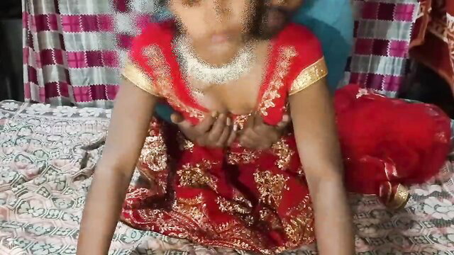 Indian bride in red saree first night with husband, cleavage tease