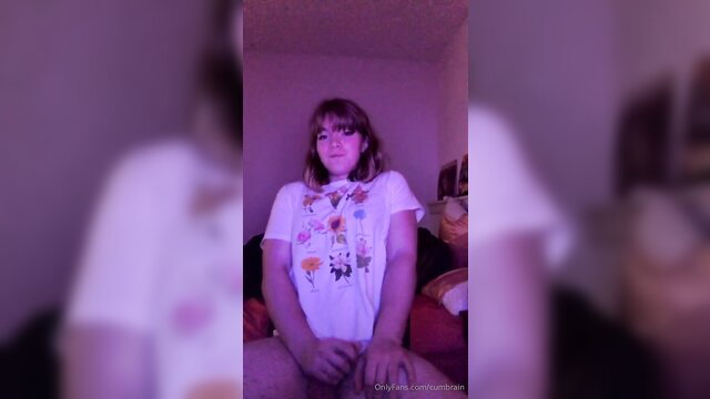 Cute brunette teen in floral tee spreads legs on bed for bedtime masturbation