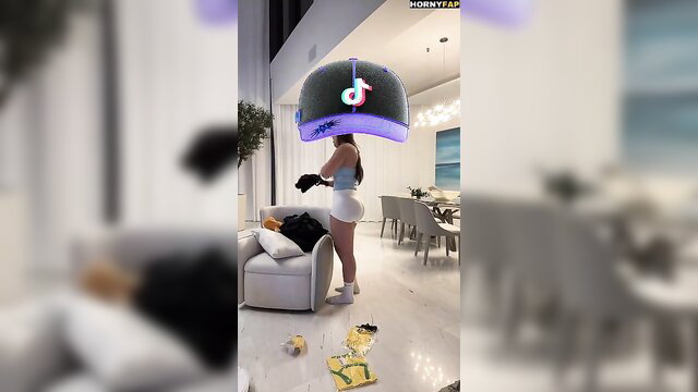 Aishah Sofey TikTok filter head hot brunette bends over in skimpy shorts