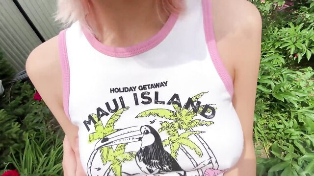 Pink-haired Asian babe in tight Maui tank top showing huge cleavage