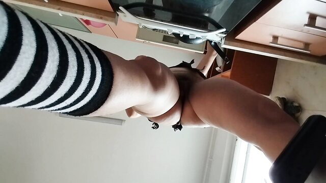 Brunette hairy pussy woman in striped sweater & heels on kitchen counter