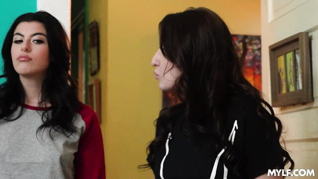 Kelsey Kane and kinky brunette friend in tight tops, lesbian strapon tease