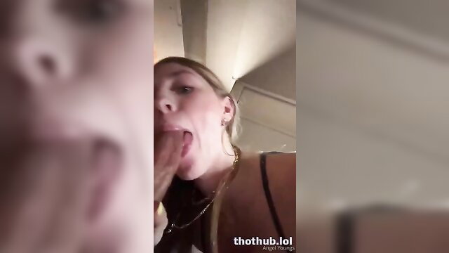 Angel Youngs sticks out tongue closeup in hot selfie video