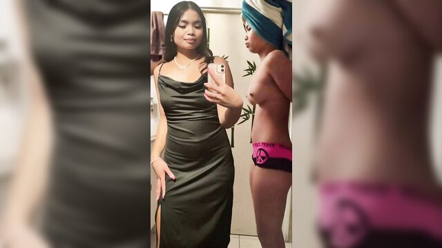18 Filipina teen in satin dress and topless friend with towel