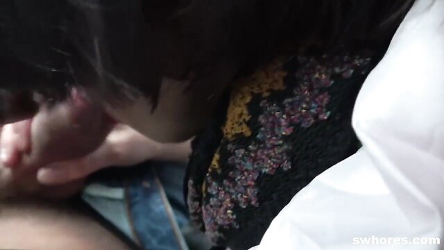 Asian woman in embroidered top licks cock on street, messy cumshot