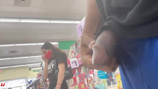 Exposed dick near unaware Asian girl in store, public flashing caught on cam