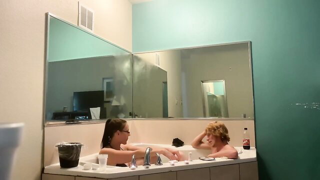 Brunette mom and redhead stepson naked in hot wet bathtub fun