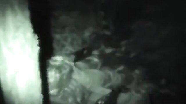 Blurry voyeur public sex thumbnail with glowing figures in dark outdoor fog