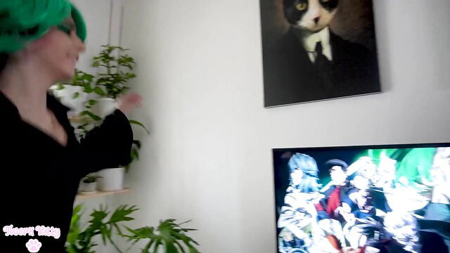 Tatsumaki cosplay babe with green wig dances in sexy black dress