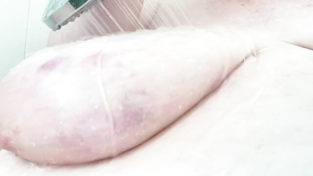 SSBBW Evie soapy shower closeup, wet huge tits and belly