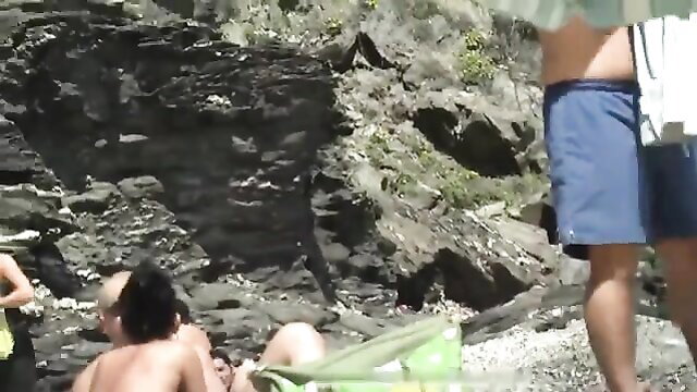Greek naked coast beauties sunbathing topless on rocky beach