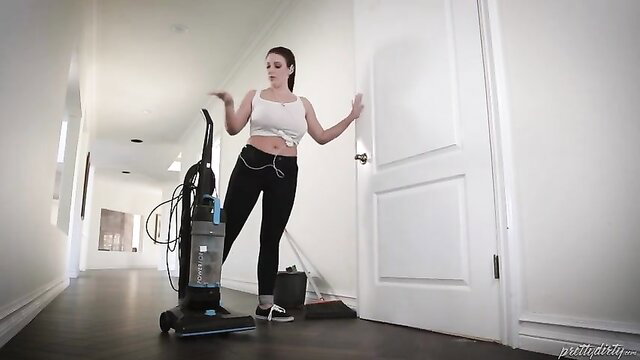 Angela White in tight white crop top and jeans vacuuming as sexy maid