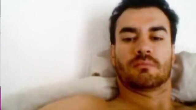 David Zepeda lying nude in bed, masturbating closeup