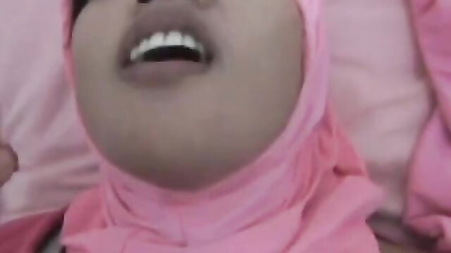 Hijab girl smiling with open mouth in homemade blowjob tease
