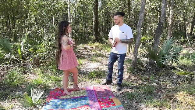 Curvy Indica Flower in pink dress with guy in forest spicy story