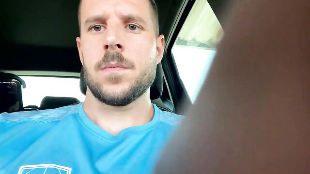 Sexy Spanish dude with beard jerks off in car closeup