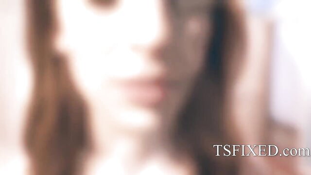 Aspen Brooks closeup portrait, seductive gaze in soft blur