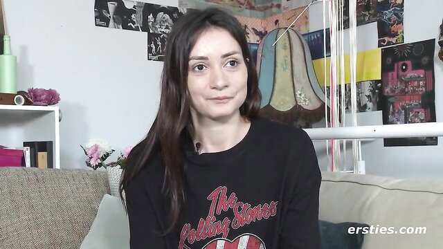 Italian MILF Valentina Bellucci smiling in Rolling Stones hoodie