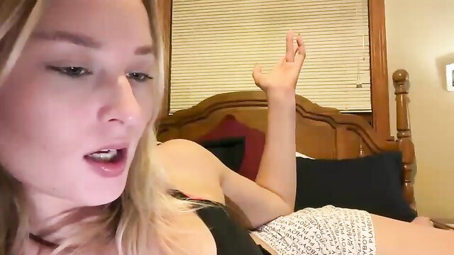 Lexistorms blonde BBW in tank top and shorts on bed, Chaturbate tease