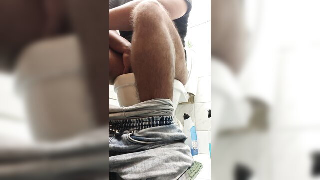 Hairy guy squatting on toilet pooping diarrhea in sexy fart slop vid