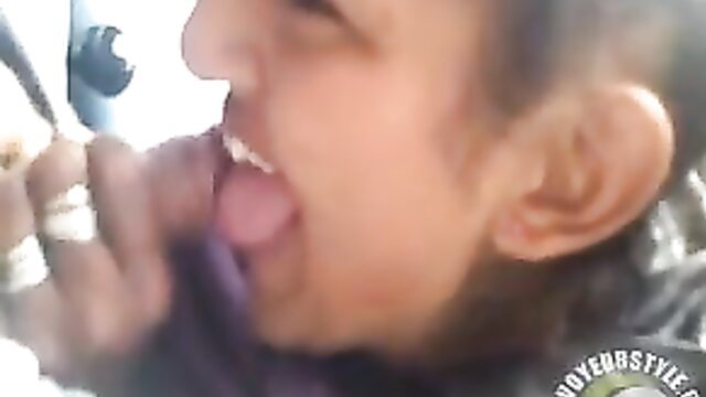 Mexican hooker gives sloppy car blowjob, tongue out deepthroat