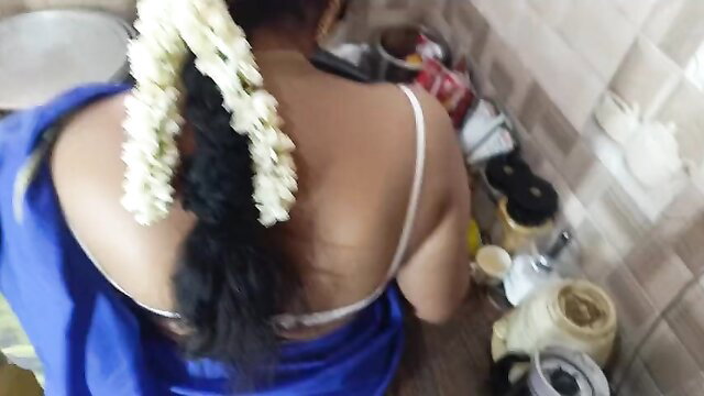 Indian Desi Aunty in Blue Saree and White Blouse Kneeling in Kitchen