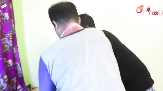 Desi Indian threesome with men in shirts behind woman