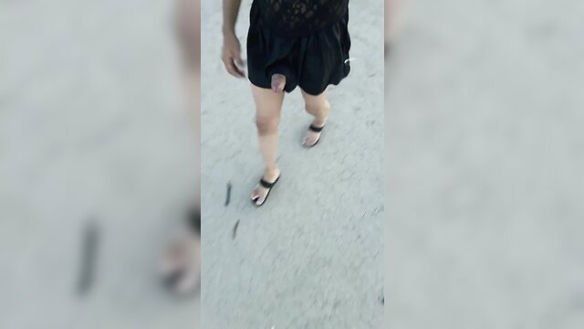 Hot Latina trans in black dress and sandals flashes cock publicly
