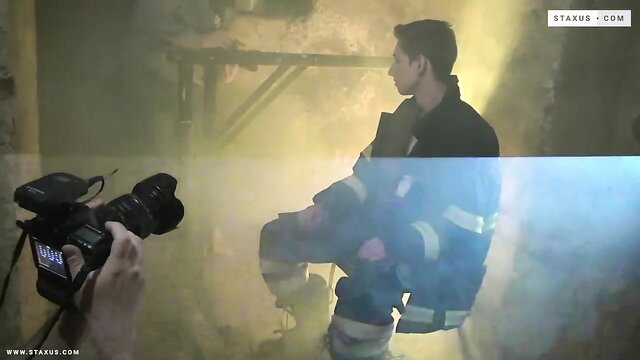 Behind the scenes BTS firefighter trans shoot with smoke and camera action