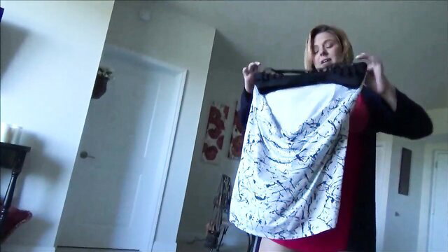 Brianna Beach holds up sexy white dress, red lingerie tease preview