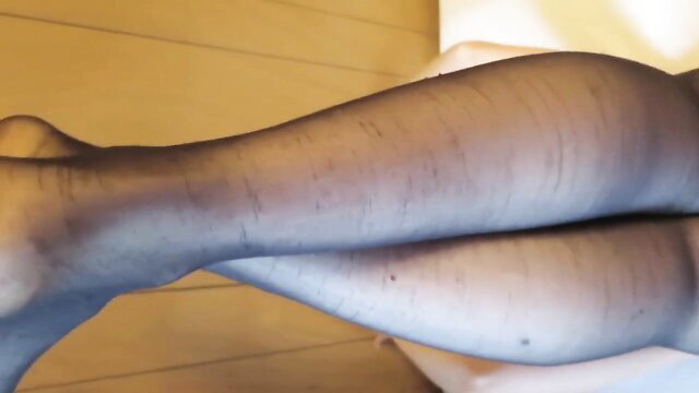 Perfect MILF in sheer black stockings spreading legs wide