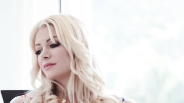 Blonde Serene Siren closeup portrait, teasing eyes lips in adult video