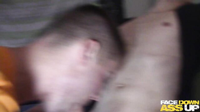 Man face down ass up in intense gay sex position, blurred action