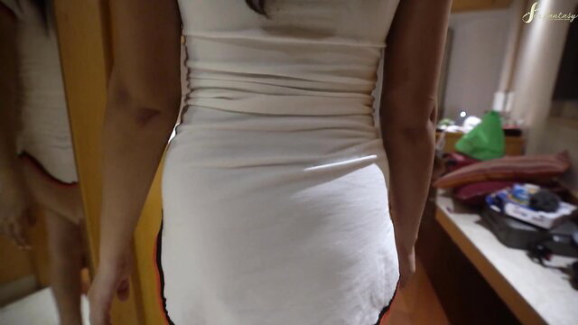 Pretty Asian lady in tight white dress shows off curvy ass from behind