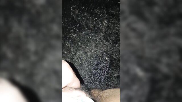 Blurry closeup of woman peeing on carpet with cum visible