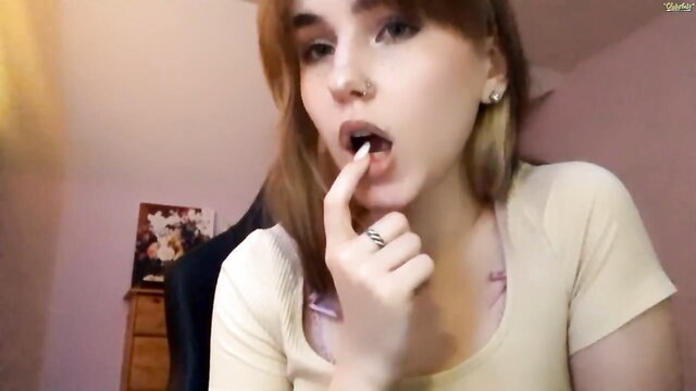 Olliefadeley beautiful teen sucks fingers seductively in public show