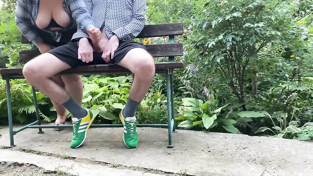Mother-in-law flashes natural tits, jerks son-in-law's dick outdoors