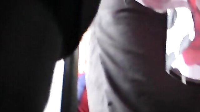 Delicate upskirt tease revealing bare pussy glimpse