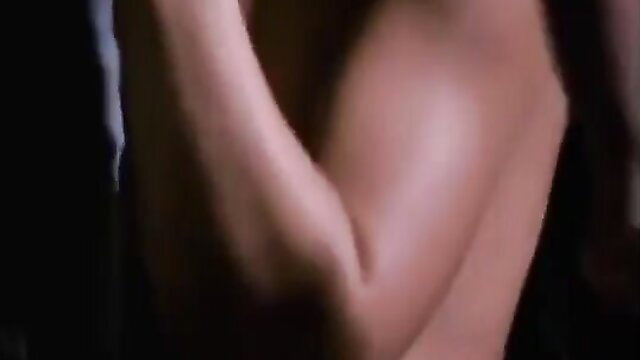 Closeup of toned white woman's muscular arm flexing in adult video thumbnail