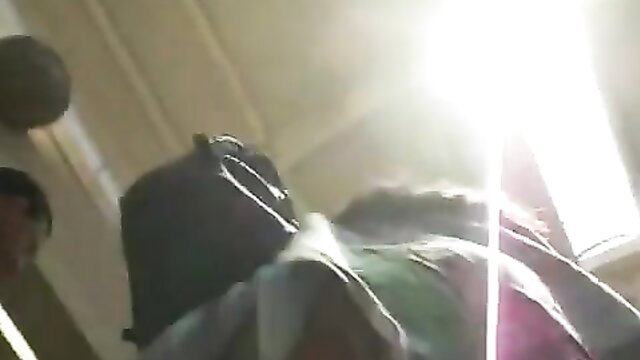 Voyeur upskirt of sexy round ass in pink panties