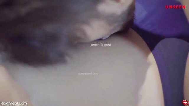 Indian woman in purple lingerie bent over, thick ass up in steamy pose