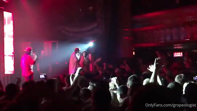 Crowd of hot concert flashers exposing tits in wild live show