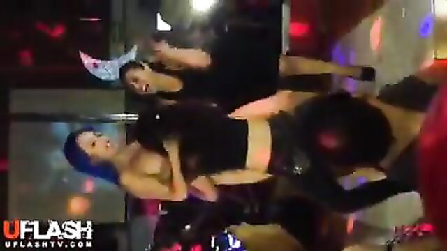 Hot Asian babes in skimpy black outfits grinding on guy at disco party