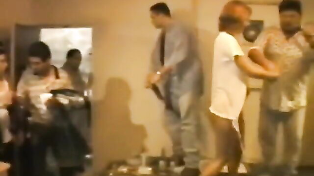 Grateful wet t-shirt woman strips naked in group amateur scene