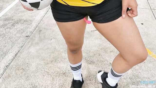 Isabellamout in soccer shorts with pink Lovense Lush toy visible, football