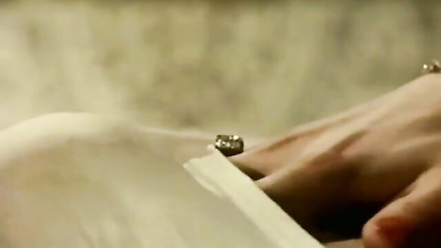 Vintage Pussycat hand with diamond ring holds paper, erotic tease